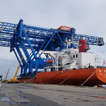 Cranes on Ship at Wharf